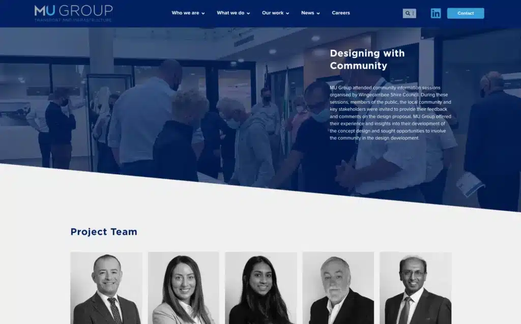 A group of people stand and talk in a modern office lobby; below are black-and-white headshots of five team members, featured on a project showcases case study website.